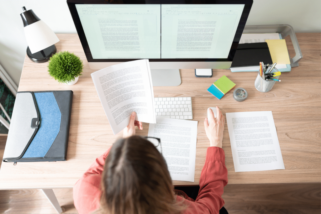 Woman writing storybrand brandscript for website